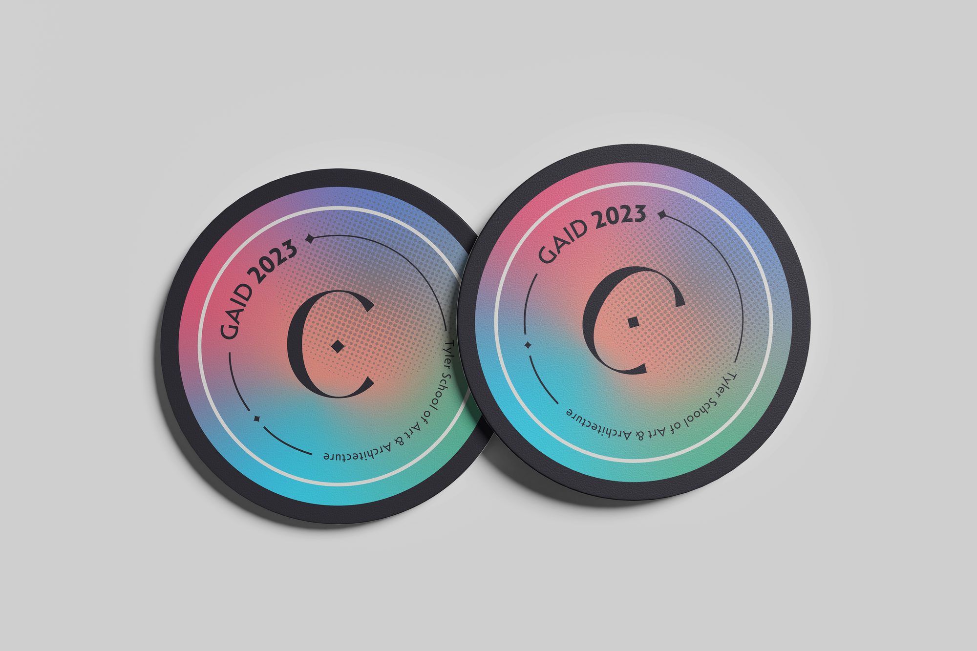 Two coasters with the responsive C mark over a halftone gradient