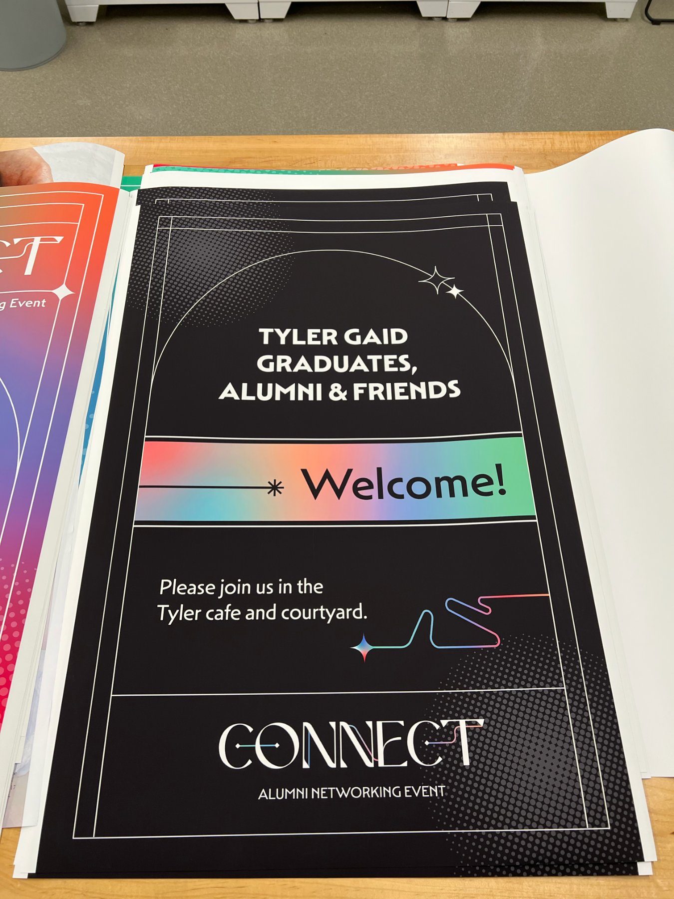 Printed welcome panel directing guests to the Tyler cafe and courtyard